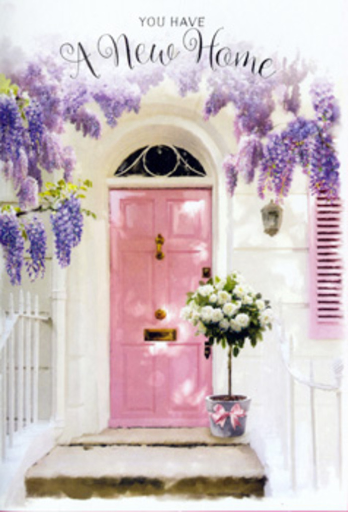 A charming residential doorway, reminiscent of a cosy home in Beckton near the quiet turns off Tollgate Road, is beautifully dressed in pastel tones and springtime bloom. The central feature is a pink front door, painted in a gentle, slightly chalky blush that suggests a hand-finished touch, its panels catching soft natural light. Surrounding the doorway, crisp whitewashed walls provide a clean, bright backdrop, while a single shutter painted in a coordinating pale pink completes the picture, echoing the same welcoming colour palette. Above and around the door, wisteria cascades in full bloom, its drooping clusters of lavender, mauve, and powdery purple flowers forming a loose canopy that seems to ripple overhead. Each strand of blossom hangs down with an airy, romantic movement, giving the whole entrance a dreamy, almost secret-garden atmosphere. At the base of the doorway, where the step meets the threshold, sits a simple metal bucket in a soft grey tone, like something repurposed from a country garden. It overflows with generous white and cream roses, each rose arranged thoughtfully to show off its full, cupped shape. Interlaced with the roses are light green leaves and fine sprigs of foliage that introduce a fresh, botanical texture. A pink ribbon wraps neatly around the bucket, tied into a careful bow that adds a final, affectionate detail. The overall mood is one of gentle anticipation, as if fresh flowers have just been delivered to someone moving into their new Beckton home-an understated yet deeply heartfelt way to wish them comfort, luck, and a warm sense of belonging from the very first day.